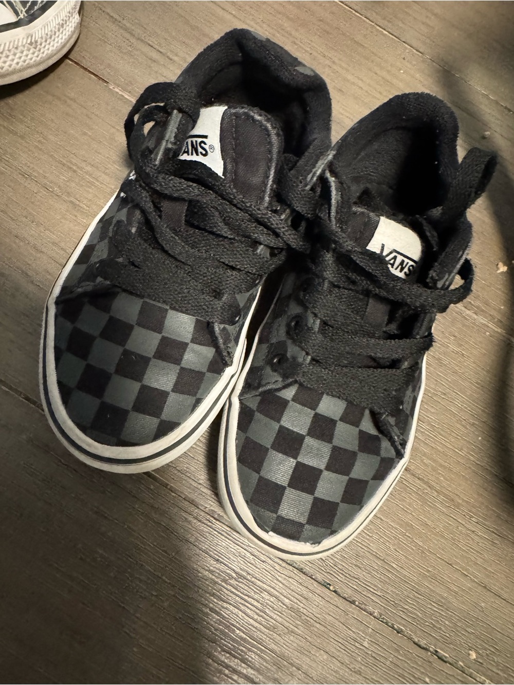 Vans Kids Checkerboard Low-Top Sneakers - Black, Chuck Taylor’s, and Sketchers.